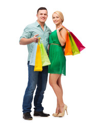 smiling couple with shopping bags