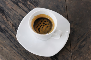 Espresso-shot on wooden table