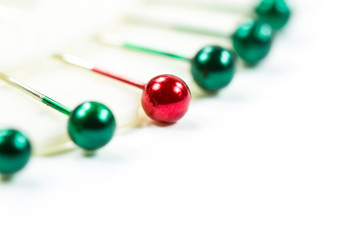 Green and red pushpin