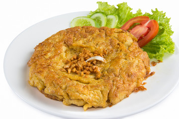 close up of omelette isolated on white dish