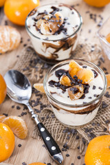 Portion of Yogurt with Tangerines and Chocolate