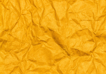 Crumpled yellow paper texture background. Craft paper sheet, viv