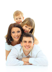 Beautiful happy family - isolated over a white background