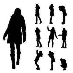 Vector silhouette of woman in winter clothes.