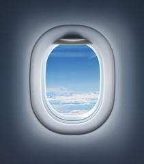 Airplane interior or jet window with clouds and sky. - 62444443