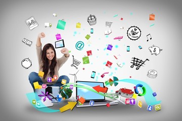 Cheering girl using laptop with app icons