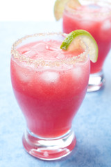 watermelon cocktail with brown sugar and lime in a glass