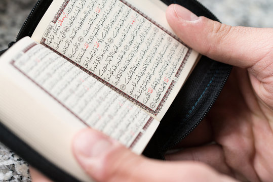 Close-up Muslim Man Reading Koran