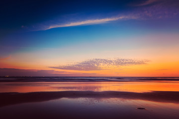 Fototapeta na wymiar Zachód słońca na plaży Baga. Goa