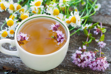 Obraz na płótnie Canvas Herbal tea with marjoram