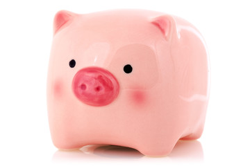 Pink piggy bank isolated on white