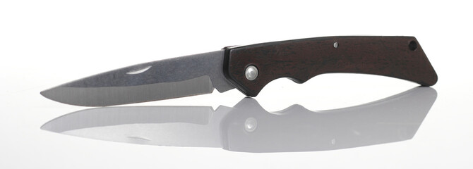 Obraz premium Pocket Knife on Glossy Floor White background