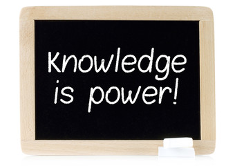 Fototapeta premium Knowledge is power on chalk board on white background
