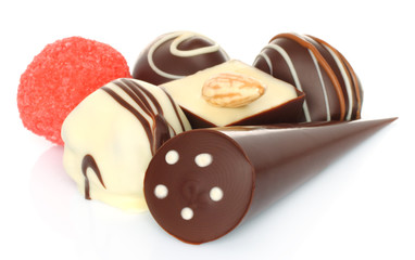 Assorted chocolate candies on white background