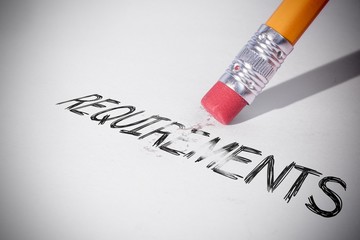 Pencil erasing the word Requirements