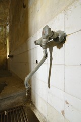 old broken faucet