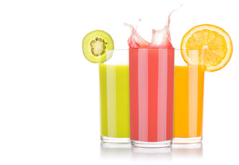 tasty summer fruit drinks in glass with splash