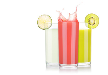 tasty summer fruit drinks in glass with splash