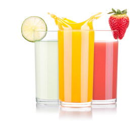 tasty summer fruit drinks in glass with splash