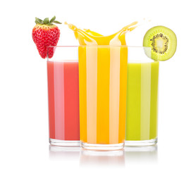 tasty summer fruit drinks in glass with splash