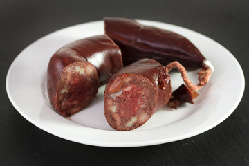 smocked sausages on plate