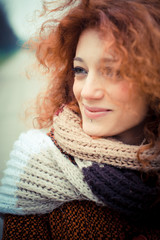 young beautiful red curly hair woman