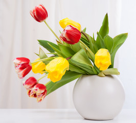 bouquet of colorful tulips in vase