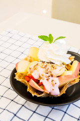 ice-cream sundae with tropical fruit