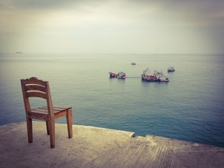 A wooden chair at sea view point