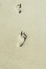 Beach sand footprints