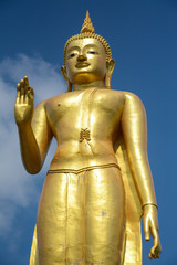 statue buddha on blue sky background in songkhla,Thailand