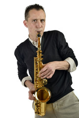 Fototapeta premium young man playing the saxophone