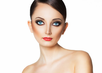 Portrait of a beautiful woman with a glamorous retro makeup