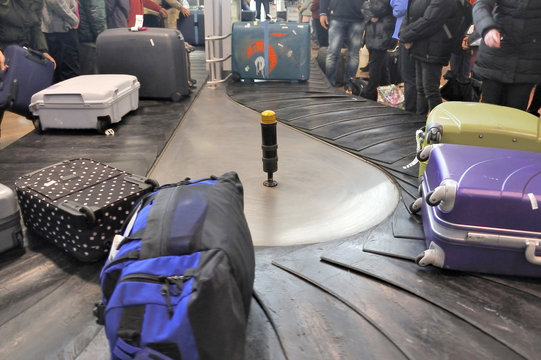 Luggages moving on baggage belt