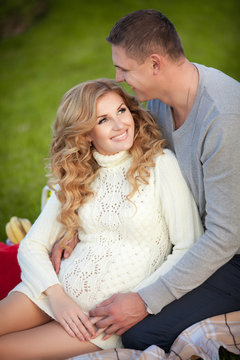 Pregnant woman and husband happy family pregnancy