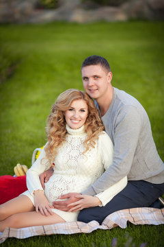 Pregnant woman and husband happy family pregnancy