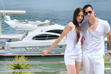 young couple on yacht