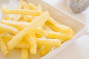 French fries on white plate