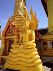 golden bhudda statue in Uthai Thani,Thailand.