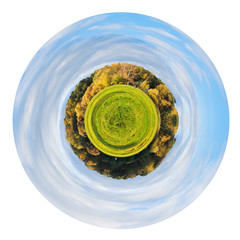 green lawn in urban park in autumn