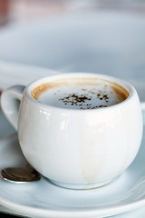 cup of cappuccino in cafe