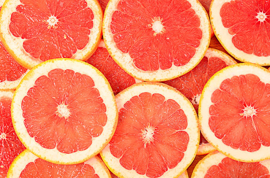 Fresh grapefruit as a background