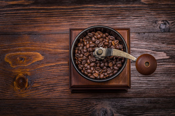coffee mill on a wooden background