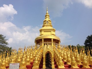 golden pagoda in Sara Buri , Thailand.  