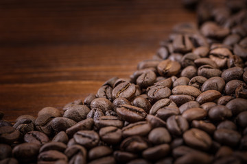 coffee beans on wooden background
