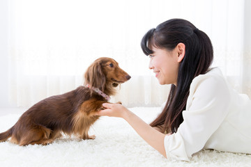 young asian woman and dog lifestyle image