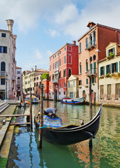 Fototapeta na wymiar Gondolas and canals in Venice, Italy