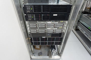 servers stack with hard drives in a datacenter