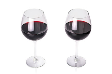 Glasses of red wine isolated on white background