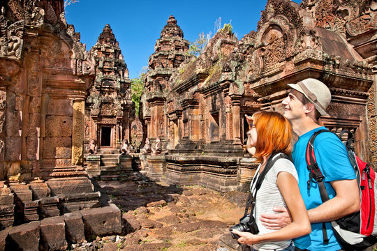 Beautiful young couple at Banteay Srei temple, Cambodia.